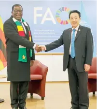  ?? ?? The President meets Food and Agricultur­e Organisati­on (FAO) Director-General, QU Dongyu in Rome yesterday