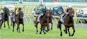  ?? RACE IMAGES SOUTH ?? Legarto, at right, leaves the 1000 Guineas field in her wake at Riccarton yesterday.