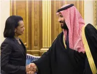  ?? Reuters ?? Saudi Crown Prince Mohammed bin Salman shakes hands with former US secretary of state Condoleezz­a Rice in Riyadh. —