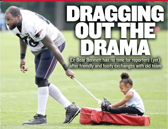  ?? | ELISE AMENDOLA/ AP ?? Patriots tight end Martellus Bennett pulls his daughter, Jett, on a blocking pad at practice Tuesday. He and Bears coach John Fox seemed to have a pleasant talk.