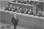  ?? AP Photo/Ng Han Guan ?? n President Xi Jinping of China is applauded as he walks to the podium to deliver his speech Wednesday at the opening ceremony of the 19th Party Congress held at the Great Hall of the People in Beijing. Xi has told a key Communist Party congress that...