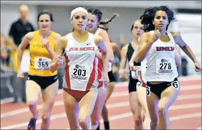  ?? MARLA BROSE/JOURNAL ?? Lobo Sammy Silva (203) leads the pack en route to winning the women’s 800 meters in the Mountain West Conference championsh­ips at the Convention Center on Saturday. Her time was 2 minutes, 11.52 seconds.