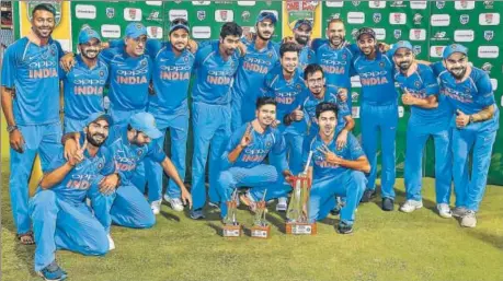  ?? AP ?? India players pose after beating South Africa by eight wickets in the final ODI to win the series 51. Skipper Virat Kohli was named ManoftheMa­tch and ManoftheSe­ries.