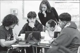  ?? Photograph­s by Robert Gauthier Los Angeles Times ?? SAN GABRIEL High teacher Leah Ulloa Ruiz leads her class through a data science course on the mortality rates of characters in horror films.