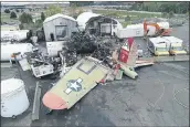  ?? NTSB ?? Damage from a World War II-era B-17 bomber that crashed at Bradley Internatio­nal Airport in Windsor Locks, Conn.