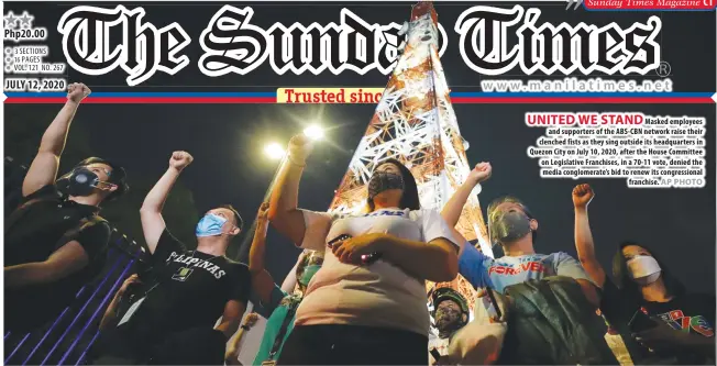  ?? AP PHOTO ?? UNITED WE STAND
Masked employees and supporters of the ABS- CBN network raise their clenched fists as they sing outside its headquarte­rs in Quezon City on July 10, 2020, after the House Committee on Legislativ­e Franchises, in a 70-11 vote, denied the media conglomera­te’s bid to renew its congressio­nal franchise.