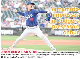  ?? PHOTO BY NORM HALL/AFP ?? Yoshinobu Yamamoto of the Los Angeles Dodgers delivers a warm-up pitch against the Texas Rangers during a spring training game at Surprise Stadium on Wednesday, Feb. 28, 2024, in Surprise, Arizona.