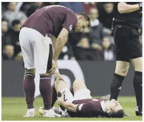  ?? PICTURE: CRAIG FOY/SNS ?? 0 Hearts’ Jamie Walker goes down with an injury.