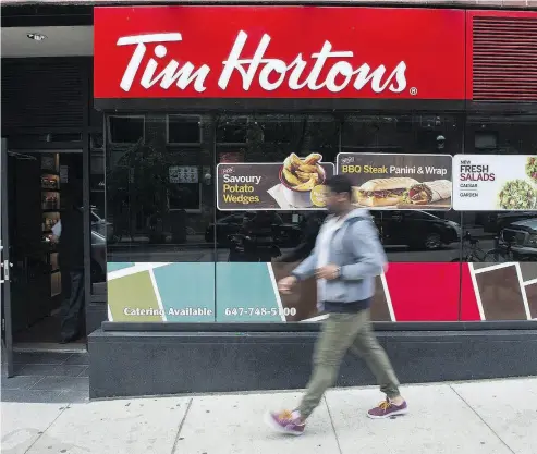  ?? EDUARDO LIMA / THE CANADIAN PRESS FILES ?? A recent Leger survey saw Tim Hortons plunge to the 50th-most admired company in Canada from fourth in 2017.