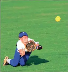  ?? FRANK CROWE / For the Calhoun Times ?? Gordon Central’s Montana Slaughter makes a diving attempt in center field during Tuesday’s game vs. Pepperell.