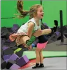  ?? MICHILEA PATTERSON — DIGITAL FIRST MEDIA ?? Lily Melton, 6, does a high jump on a trampoline at the Get Air Trampoline Park in King of Prussia on Wednesday.