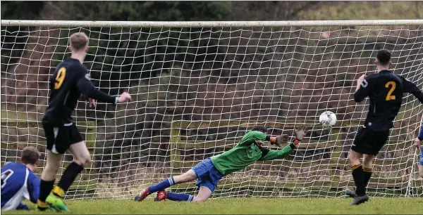  ??  ?? Avonmore’s Oisin McGraynor (9) looks on as his 20-yard effort flies into the Tombrack net during the LFA Youth Cup in Pat O’Toole Park, Rathdrum.