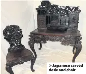  ??  ?? > Japanese carved desk and chair