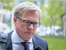  ?? JEFF MCINTOSH/THE CANADIAN PRESS ?? Alberta Minister of Education David Eggen arrives for a cabinet meeting in Calgary, Alta. in 2015. Alberta’s education minister says he plans to change the law to prevent conservati­ve leadership candidate Jason Kenney from outing gay children. David...