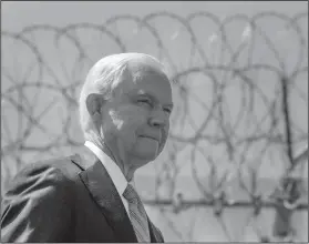  ?? Hayne Palmour IV/The San Diego Union-Tribune via AP, File ?? Conference at the border: In this April 21, 2017 file photo, with razor wire across the top of the secondary border fence behind him, U.S. Attorney General Jeff Sessions attends a news conference at the U.S.-Mexico border next to the Brown Field Border...