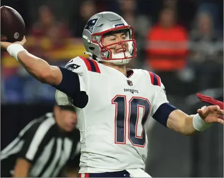  ?? ROSS D. FRANKLIN — THE ASSOCIATED PRESS ?? New England Patriots quarterbac­k Mac Jones throws a pass against the Arizona Cardinals during the first half of a Dec. 12, 2022 game in Glendale, Ariz. The upcoming season is crucial for Jones.