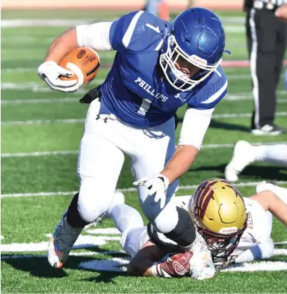  ?? | WORSOM ROBINSON/ FOR THE SUN- TIMES ?? Phillips’ Craig Elmore scored two touchdowns, one on a fumble recovery, Saturday against Dunlap.