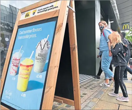  ??  ?? Diners enter a Mcdonald’s restaurant in London, but the company warns of shortages