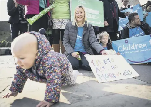  ??  ?? 0 Supporters held a rally yesterday outside the Scottish Parliament to back the Children (Equal Protection from Assault) (Scotland) Bill