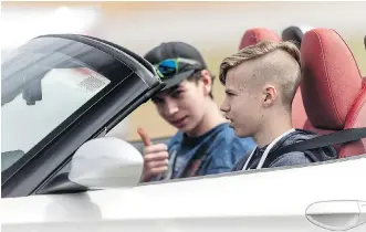  ?? CHRIS TEDESCO/ FOR BMW ?? Teens at the BMW Performanc­e Center Teen Driving School are encouraged to “wail on the cars” to learn how to make life- saving split- second decisions.