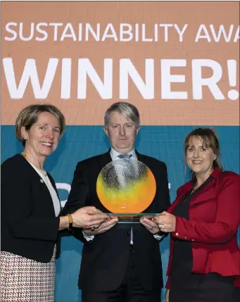  ??  ?? Pictured are Tara McCarthy, CEO, Bord Bia, presenting the Sustainabi­lity Eoin Ryan, Sales and Marketing Manager of ABP and Fiona Geraghty.