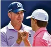  ?? GETTY IMAGES ?? Jordan Spieth (right) swung for a knockout with Saturday’s 5-under 65, but Matt Kuchar — while three shots back — is still standing after a 66.