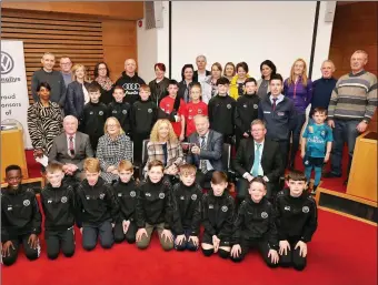  ??  ?? Sligo Leitrim Super Cup squad with parents, sponsors and local politician­s.