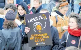  ?? AP ?? Demonstrat­ors protest against an immigratio­n law outside the Constituti­onal Council, Thursday, January 25, 2024 in Paris. France’s Constituti­onal Council rejected several measures in a divisive new immigratio­n law that critics call inhumane, in a new blow to President Emmanuel Macron and his government.