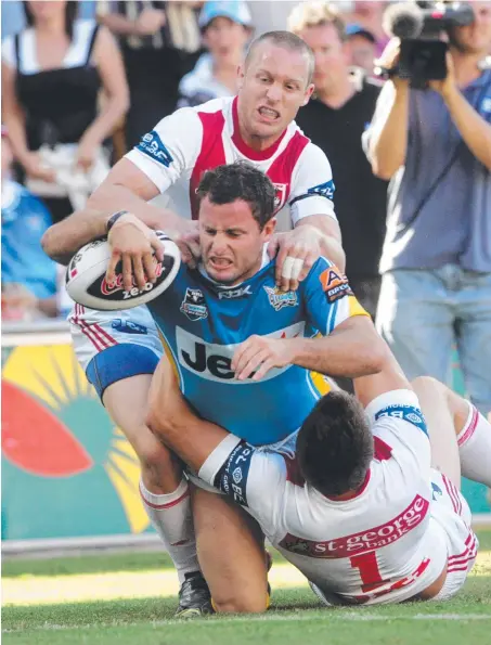  ?? Picture: GLENN BARNES ?? Chris Walker earns a place in history by scoring the Gold Coast Titans’ first try in the NRL in 2007.