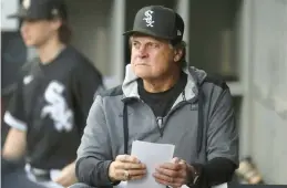  ?? CHRIS SWEDA/CHICAGO TRIBUNE ?? White Sox manager Tony La Russa looks out from the dugout before the start of a game against the Rangers at Guaranteed Rate Field on Friday.