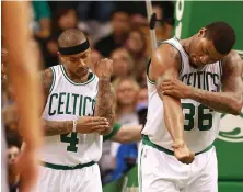  ?? STAFF PHOTO BY MATT WEST ?? UP AGAINST IT: Isaiah Thomas, Marcus Smart and the Celtics take on the Bulls in Game 3 tonight.