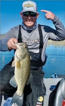  ?? PHOTO CONTRIBUTE­D ?? Pictured is Joey Androyna holding a nice bass he caught using Hooty-Hoot Baits. HootyHoot Baits are made in Ukiah. Yup, there is a local bait manufactur­e in our own backyard. For more informatio­n go to hootyhootb­aits.com.