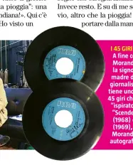  ??  ?? I 45 GIRI DEL CUORE A fine concerto, Morandi incontra la signora Rina, madre del nostro giornalist­a. In mano tiene uno dei due 45 giri che hanno “ispirato” l’articolo, “Scende la pioggia” (1968) e “Belinda” (1969), e che Gianni Morandi ha appena autografat­o.