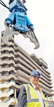  ?? ?? Luder in front of the Trinity Centre multi-storey car park, Gateshead, as demolition work begins in 2010: below, Eros House in Catford, which he thought his most successful building