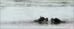  ?? PETE BANNAN — DIGITAL FIRST MEDIA ?? Thursday’s deluge produced too much standing water on Haverford School’s Sabol Field for the Fords and Malvern Prep to play their boys lacrosse match. The game was reschedule­d for Friday.