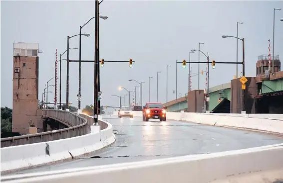  ?? JERRY JACKSON/BALTIMORE SUN ?? Cianbro’s overhaul of the Pennington Avenue Bridge ran $11.4 million over initial projection­s when structural problems were discovered as city engineers did more work at the site.