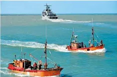  ??  ?? Elena Alfaro (left), a relative of missing submariner Cristian David Ibanez, at the navy base in Mar del Plata following news that a ‘violent event’ was detected near the last known position of the San Juan. Searches for signs of the missing vessel...