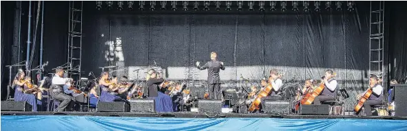  ?? PHOTOS: SUPPLIED ?? Family . . . The Virtuoso String Orchestra playing in the Symphony at the Park at the Jerry Collins Stadium, aka Porirua Park, earlier this year.