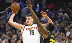  ?? JED JACOBSOHN / AP ?? Nuggets center Nikola Jokic was the first in league history to eclipse 2,000 points, 1,000 rebounds and 500 assists in a season. And that sort of dominance by “Joker” convinced voters he should be the 13th player in the NBA’s MVP back-to-back club.