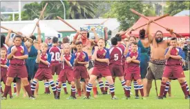  ??  ?? Members of cultural group Te Tira Paraoa and the Kaikohe Rugby Club juniors perform a haka powhiri for the players.