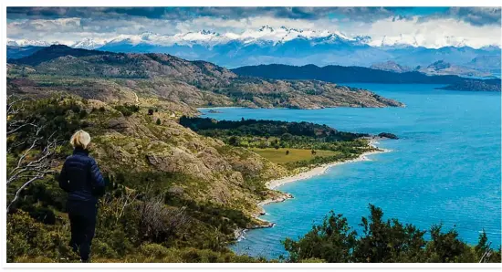  ??  ?? FEELING BLUE. Hanlie looks out over Lake General Carrera, which spans both Chile and Argentina. (It's called Lake Buenos Aires in Argentina.)