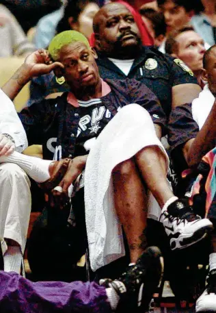  ?? Associated Press file photo ?? Dennis Rodman pouts in the fourth quarter during Game 4 of the Spurs’ second-round series with the Lakers in 1995 after being benched for the entire game by coach Bob Hill.