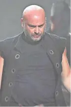  ?? GETTY IMAGES ?? Disturbed (including singer David Draiman) will play Fiserv Forum Oct. 13.