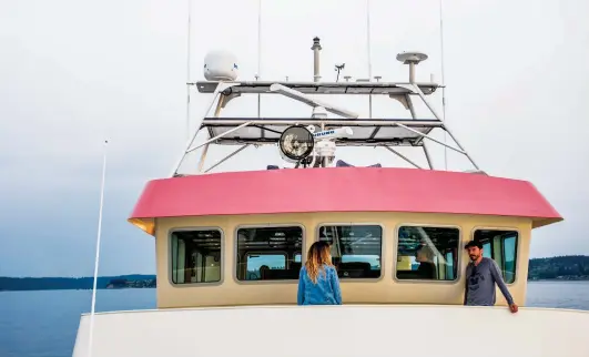  ??  ?? A Portuguese bridge wraps around the pilothouse, offering an element of protection, as well as panoramic views of the surroundin­gs.