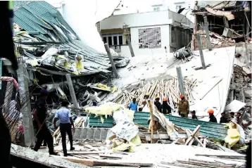  ??  ?? File picture of the Wellawatte building collapse.