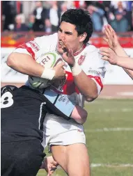  ??  ?? HITTING A WALL:
Our delve into the archives today focuses on Hull KR prop David Tangata-toa, the Aussie import who played for the Robins from 2005 to 2007. Pictured, Tangata-toa meets a strong defence during the Robins game against Feathersto­ne Rovers at Craven Park in 2005.