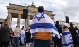  ?? Photograph: Sean Gallup/Getty Images ?? A rally in solidarity with Israel at the Brandenbur­g Gate in Berlin, Germany, 22 October 2023.