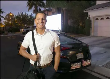  ?? Richard Brian Las Vegas Review-Journal @vegasphoto­graph ?? Podiatrist Sean Reyes on Monday with his “footmobile,” which he uses to make house calls to locals and tourists.