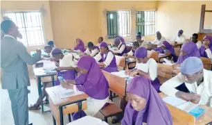  ?? ?? Students writing WAEC in Abuja recently