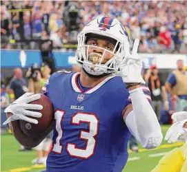  ?? Harry How/Getty Images ?? Wide receiver Gabe Davis of the Buffalo Bills celebrates after scoring on a 26-yard touchdown reception against the Los Angeles Rams during the first quarter at SoFi Stadium on Sept. 8 in Inglewood, Calif.